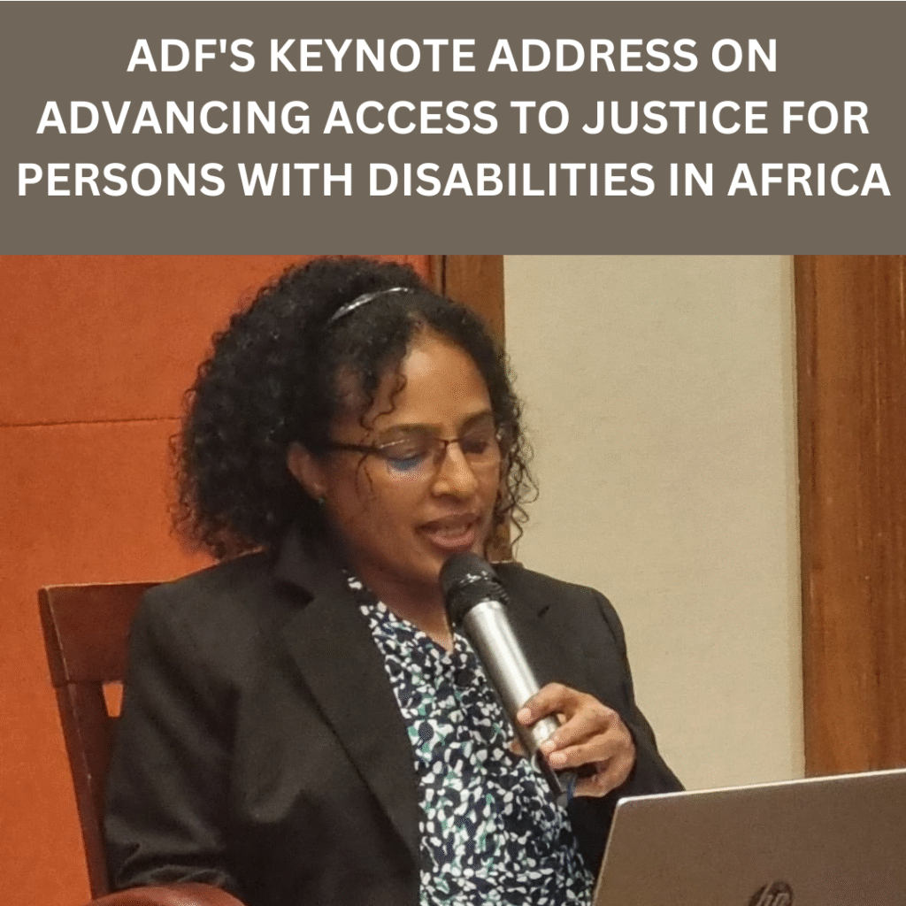 Shitaye Astawes, speaks into a microphone while reading from a laptop. She is seated in front of a wooden panel and cream wall. The image includes a heading at the top in bold white text on a brown background that reads: “ADF'S KEYNOTE ADDRESS ON ADVANCING ACCESS TO JUSTICE FOR PERSONS WITH DISABILITIES IN AFRICA.”