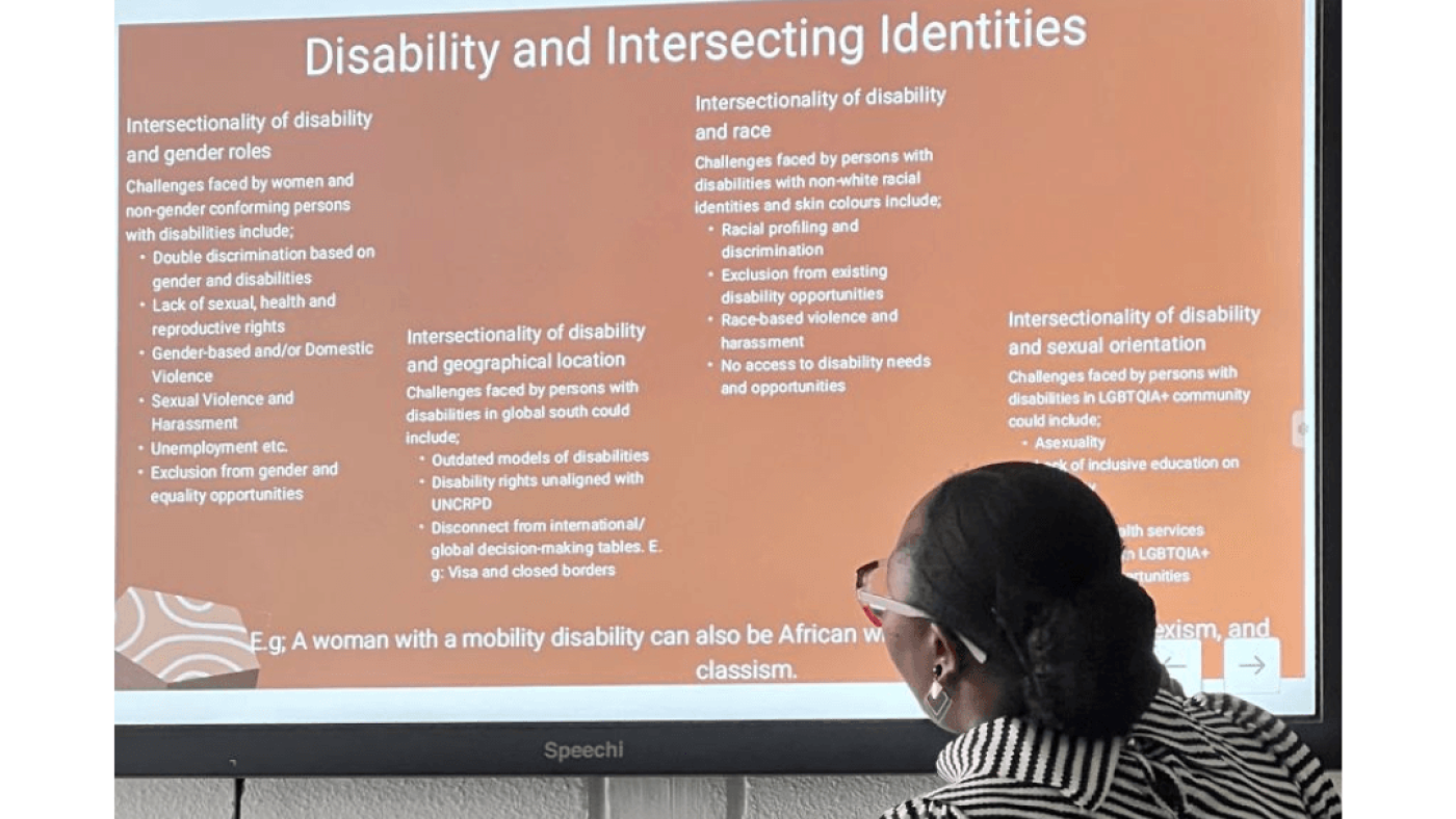 Heading that says Two Alumni Success Stories from the ADF Women’s Leadership Programme. An image below shows a woman facing a big screen as she is teaching. The screen says "Disability and intersecting identities"||||