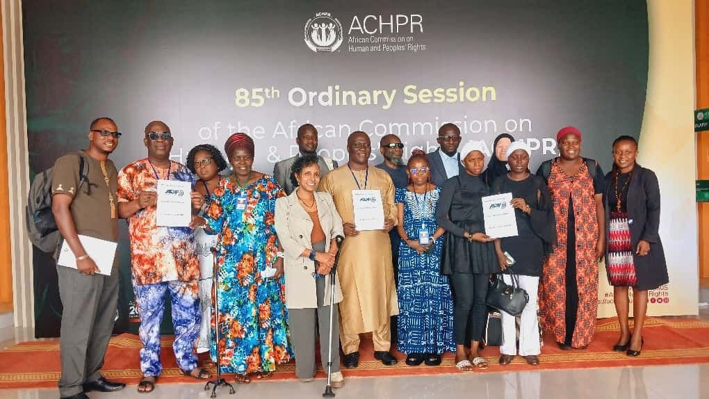 Group photo of ADF and OPD representatives at the 85th Ordinary Session of the African Commission on Human and Peoples’ Rights, celebrating the granting of Observer Status.